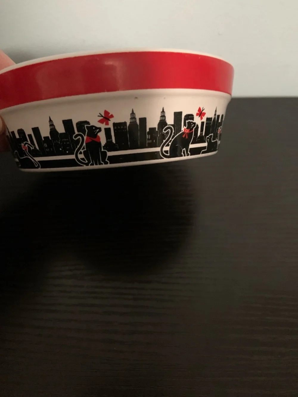 Pet bowl with whimsical city cats design